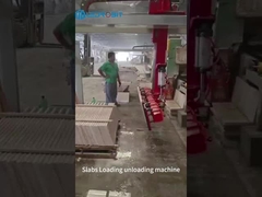 Machine de chargement et de déchargement de dalles pour charges lourdes dans les milieux industriels